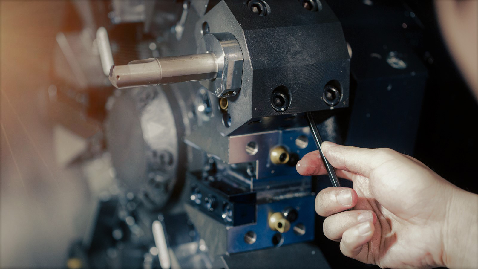 CNCTech operator's installing cutting tools